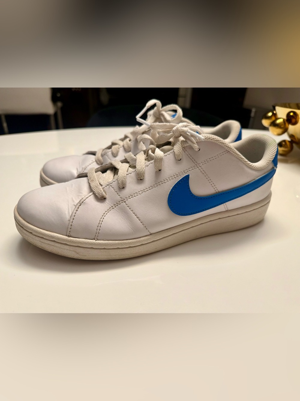 Nike White Sneakers with Blue Swoosh